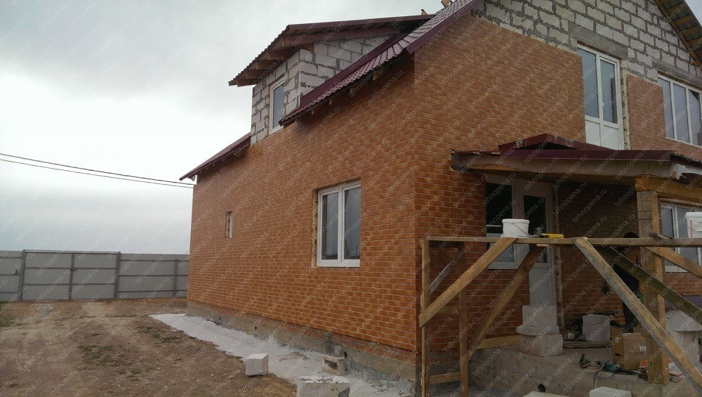 Утепление дома из блоков термопанелями 